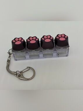 Brown Keycaps with Pink Paw Print bag charm